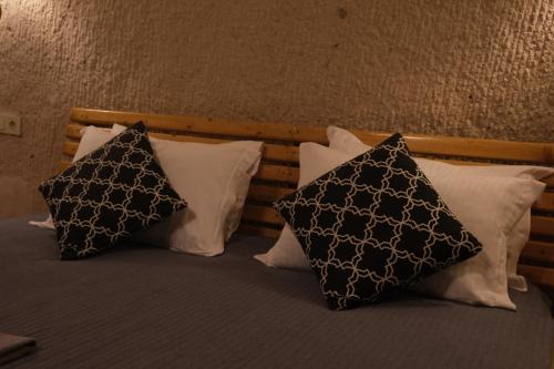 Pinhan Cave Suitesにあるベッド