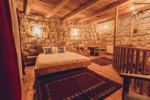 Pinhan Cave Suitesにあるベッド