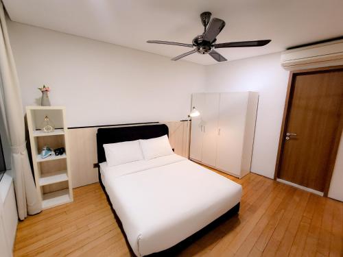 Un ou plusieurs lits dans un hébergement de l'établissement Vortex klcc suites