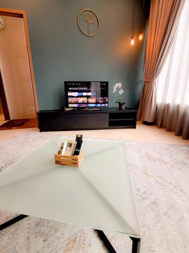 Télévision ou salle de divertissement dans l'établissement Vortex klcc suites