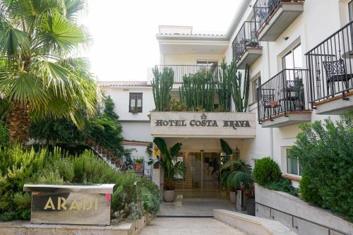 a hotel with a sign that reads aradj at Hotel Costa Brava in Platja  d'Aro