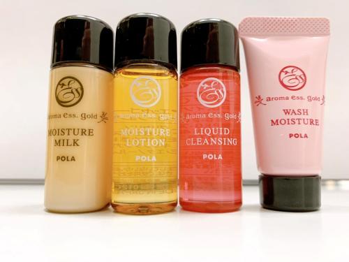 a group of four different bottles of hair products at Smile Hotel Premium Kanazawa Higashiguchiekimae in Kanazawa