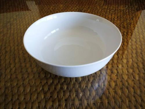 a white bowl sitting on top of a table at Hua Hin Blue Lagoon in Cha Am