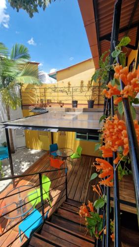 a balcony with a table and chairs on a building at Hotel La Caracola Salento in Salento