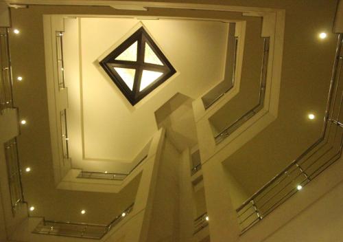 a room with a star on the ceiling of a building at Hotel Hongkong Inn - Hotel in Amritsar in Amritsar