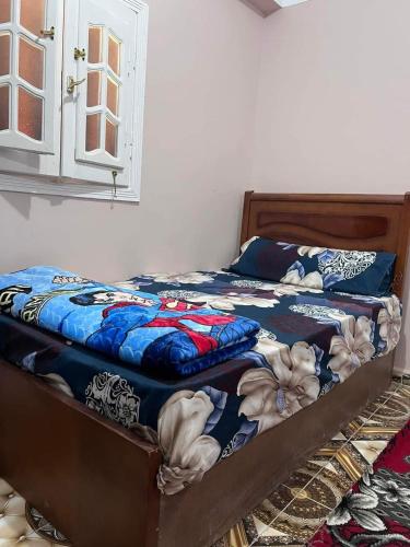 Ένα ή περισσότερα κρεβάτια σε δωμάτιο στο Siwa Shali Hostel
