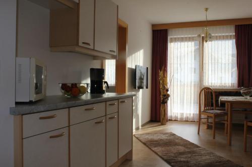 Kuchyň nebo kuchyňský kout v ubytování Schlossmühle