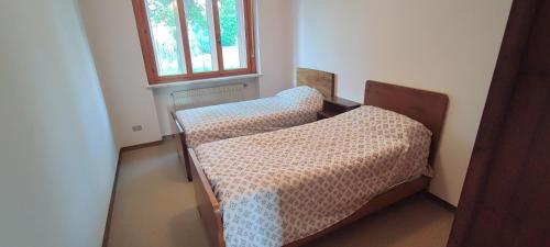 Postel nebo postele na pokoji v ubytování Cjase Prenoni