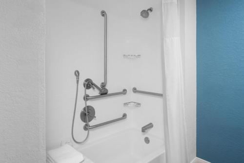 a shower in a bathroom with a toilet at Residence Inn Boston Dedham in Dedham