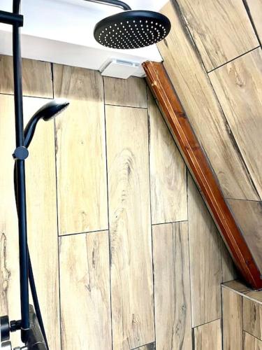 a pair of skis sitting on a wooden floor at Chalet 6-8 pers St Lary Alt1700m -100mdespistes classé 4 étoiles in Saint-Lary-Soulan