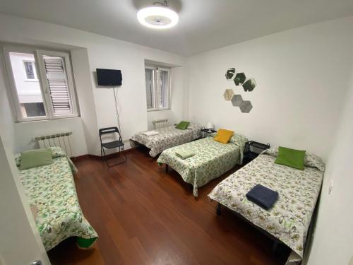 Katil atau katil-katil dalam bilik di Affittacamere Guerrero Rooms
