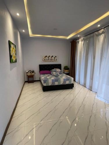 Ένα ή περισσότερα κρεβάτια σε δωμάτιο στο Villa Elsye