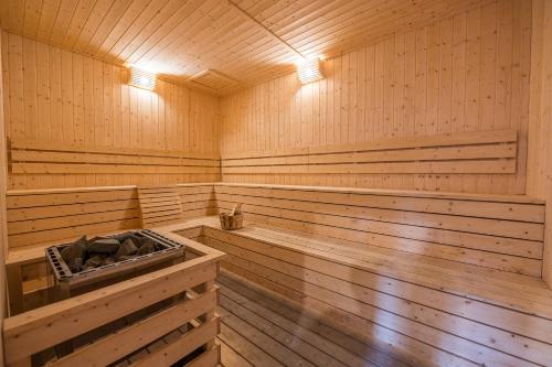 a large wooden sauna with wooden flooring and a wooden at Kuala Lumpur luxury MRT Suntex in Cheras