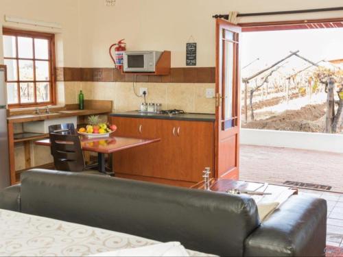 Kuchyň nebo kuchyňský kout v ubytování Ou Skool Guesthouse
