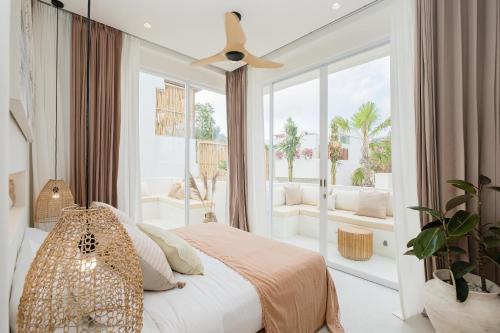 Ένα ή περισσότερα κρεβάτια σε δωμάτιο στο Mazari Villas