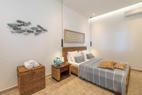 a bedroom with a bed and a side table at Skali Retreat in Atsoupádhes