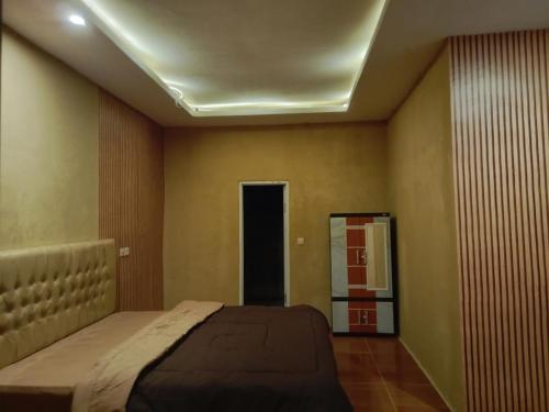 Ένα ή περισσότερα κρεβάτια σε δωμάτιο στο Sagara home