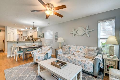 a living room with a couch and a table at 1st-Floor Condo with Pool on Intracoastal Waterway! in Myrtle Beach