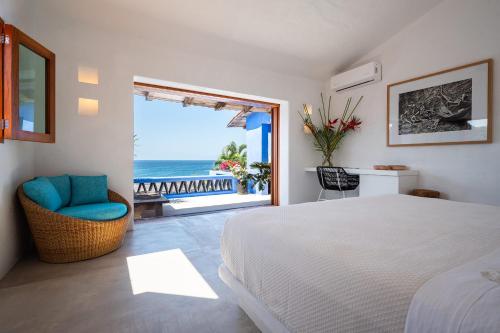 Ένα ή περισσότερα κρεβάτια σε δωμάτιο στο Private Villas in Careyes