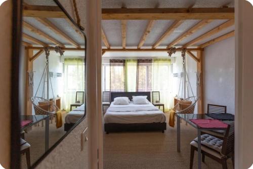 En eller flere senge i et værelse på Studio L'air marin