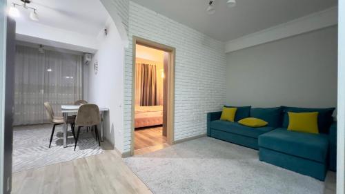 Svetainės erdvė apgyvendinimo įstaigoje Apartament