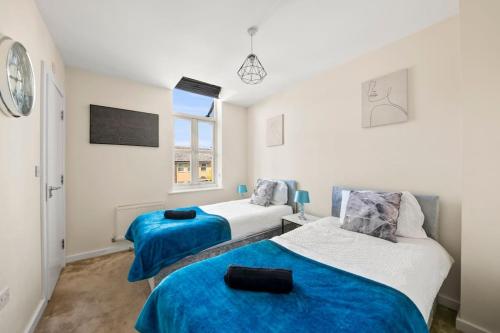Katil atau katil-katil dalam bilik di Heart of Reading Centre with parking & garden