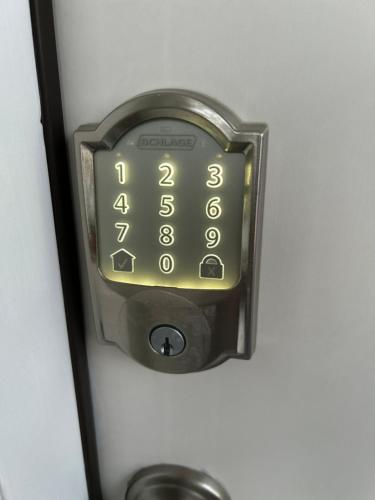 an alarm clock is hanging on a wall at Your Weaver Rest Stop on the Ladiga Trail! in Weaver