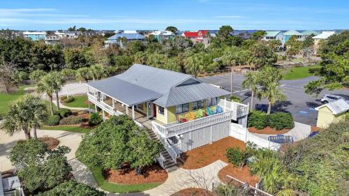 an aerial view of a large house with a roof at The Salty Breeze - Ocean Front 1 Bedroom in St. Helena Island