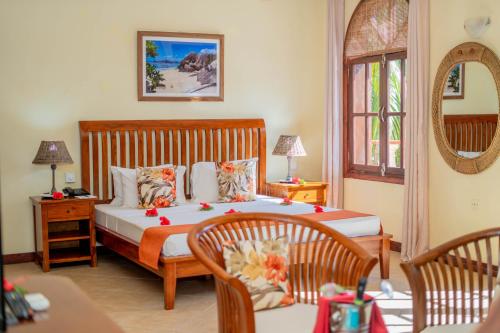 Ένα ή περισσότερα κρεβάτια σε δωμάτιο στο Castello Beach Hotel
