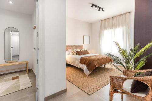 En eller flere senge i et værelse på Luxury apartment in Alicante
