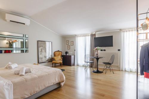 Кровать или кровати в номере Il Battistero Siena Residenza d'Epoca