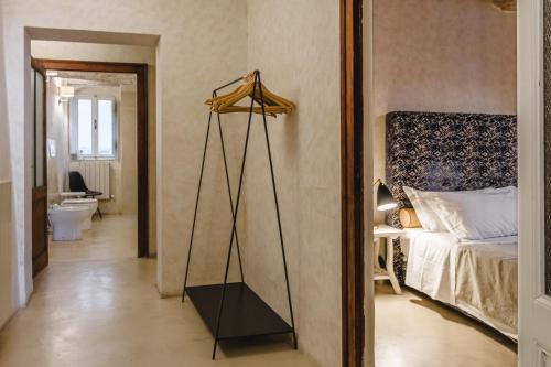 Кровать или кровати в номере Il Battistero Siena Residenza d'Epoca