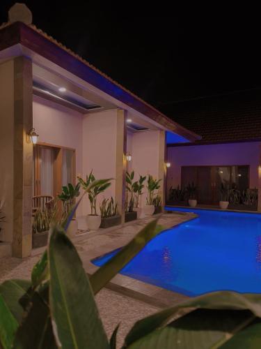 Kolam renang di atau dekat dengan Surya Pandawa Homestay