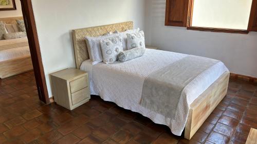 Кровать или кровати в номере Santa Sofia Casa Boutique