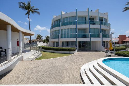 Bazén v ubytování Luxo e conforto pé na areia em Barra de São Miguel nebo v jeho okolí