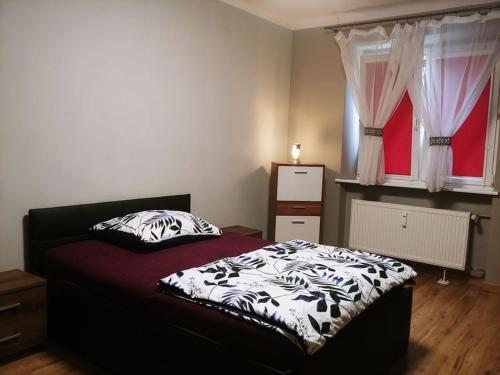 Posteľ alebo postele v izbe v ubytovaní Mazur