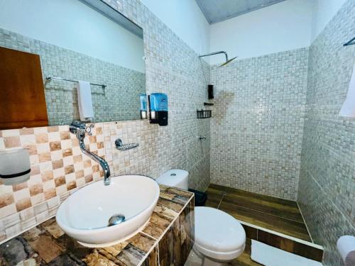 Koupelna v ubytování Cabaña Santorini Colombiano
