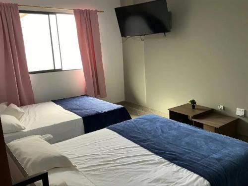 Katil atau katil-katil dalam bilik di Aparta Suite Torre De Prado Penthouse