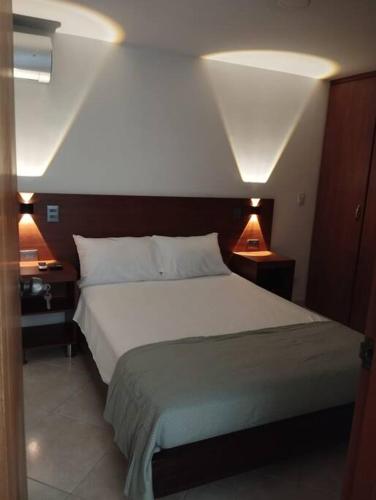 Ένα ή περισσότερα κρεβάτια σε δωμάτιο στο Crisalida Apartamento