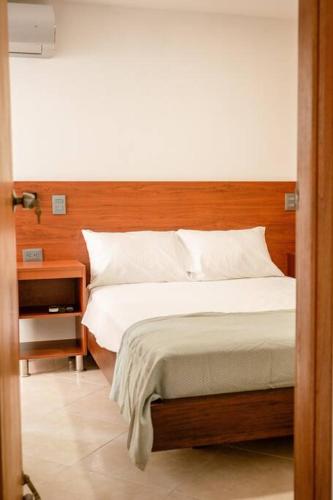 Ένα ή περισσότερα κρεβάτια σε δωμάτιο στο Crisalida Apartamento