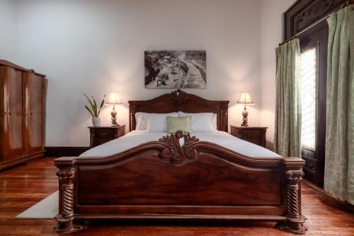 Ένα ή περισσότερα κρεβάτια σε δωμάτιο στο Hotel Majestad