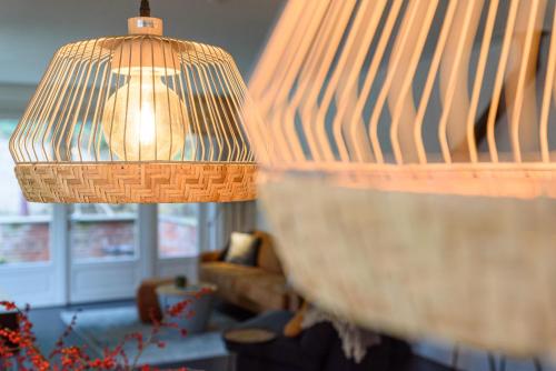a pair of lamps in a living room at Spacious and attractive family home near Amsterdam in Overveen