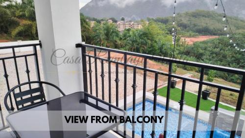 a view from the balcony of a house at Casa Rembayu Villa Mountain View Baling in Baling