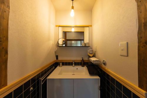 Kuchyň nebo kuchyňský kout v ubytování 国東市の自然に囲まれた一棟貸し宿