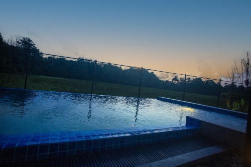 Der Swimmingpool an oder in der Nähe von Greencliff Mirissa