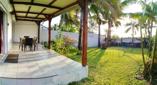 Zahrada ubytování Maison Les Cocotiers de Plaiz'Anse