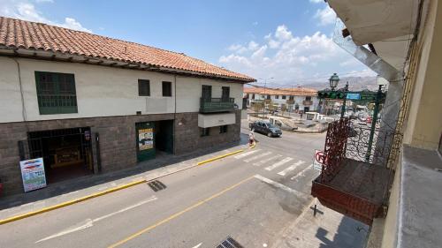 an aerial view of an empty street in a town at Templo de la Luna in Cusco