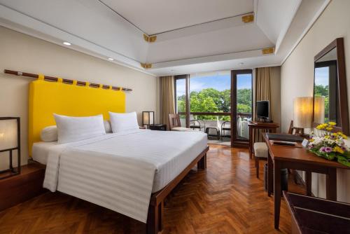 Un ou plusieurs lits dans un hébergement de l'établissement Prama Sanur Beach Bali
