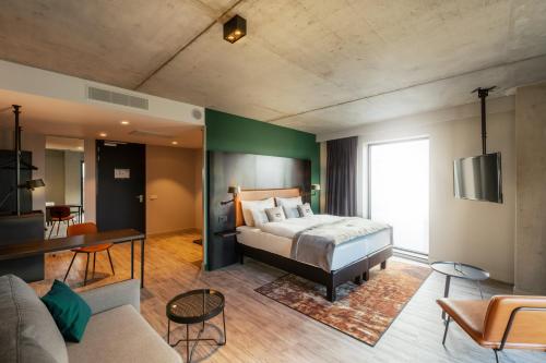 Postel nebo postele na pokoji v ubytování Holiday Inn - the niu, Fender Amsterdam
