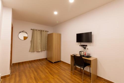 TV/Unterhaltungsangebot in der Unterkunft Treebo Seventh Heaven Kukatpally